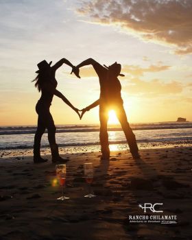 Nicaragua beach Rancho Chilamate sunset two people making a heart – Best Places In The World To Retire – International Living
